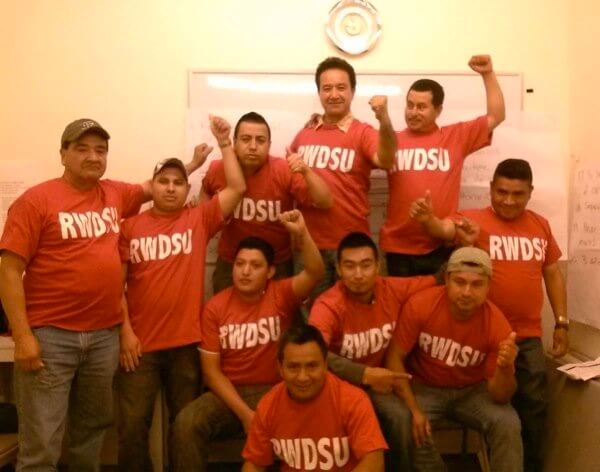 Original carwasheros celebrate first union contract extension