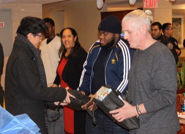 Students bring holiday cheer to Maspeth shelter residents