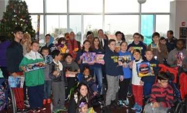 Vallone hands out toys at St. Mary’s Hospital for Children in Bayside