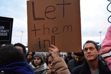 Protesters at John F. Kennedy Airport on Aug. 28 demanded that an immigration ban by President Donald Trump be lifted.