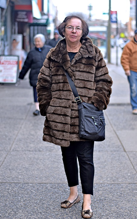 Joanna is originally from Greece. "Where else? This is Astoria after all!" she quipped. I was struck by her Parisian-inspired ensemble of ankle-skimming black pants, ballet slippers and a brown fur jacket. Effortlessly chic.