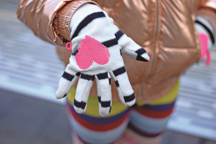 A close-up view of Kenzy's gloves.