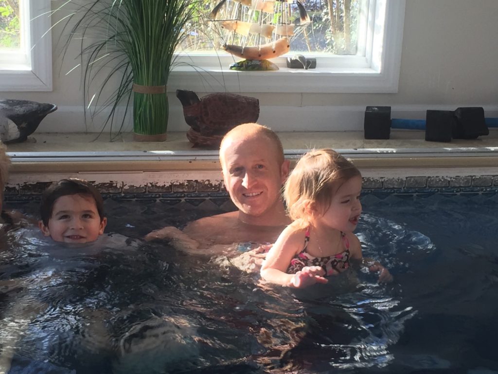 Josh with his Sloane and Hudson in my endless pool.
