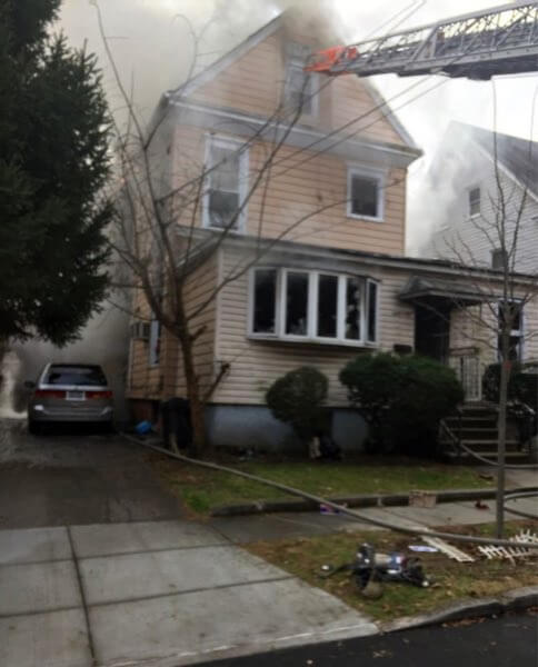 Fire damages Flushing home, injuring five