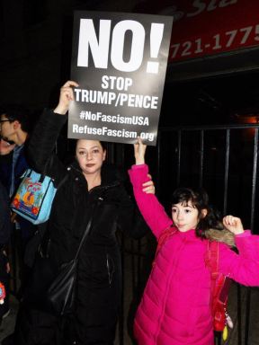 Astoria rally against travel ban leans on immigrant values