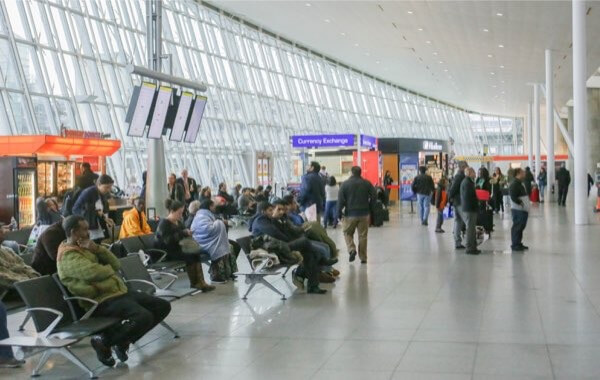 Individuals pass through unattended JFK Airport security checkpoint