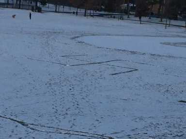 A swastika scrawled into the snow at Juniper Valley Park in Middle Village on the morning of Feb. 1.