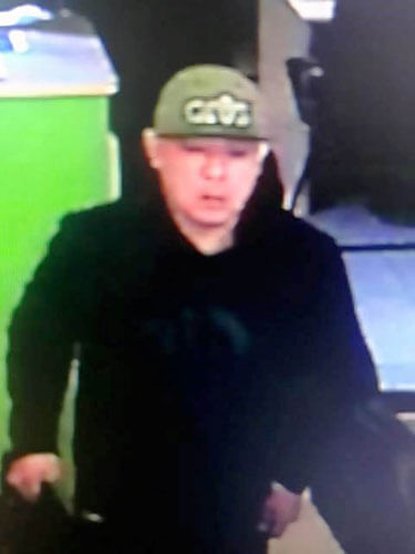 Police search for armed robbers who hit two Flushing establishments