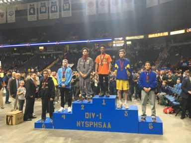 Dreaming big: Bowne star makes PSAL history on wrestling mat