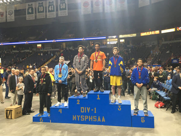 Dreaming big: Bowne star makes PSAL history on wrestling mat