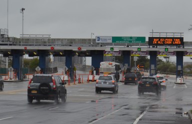 The toll booth at the Cross Bay Bridge will soon be replaced by an open road tolling system.