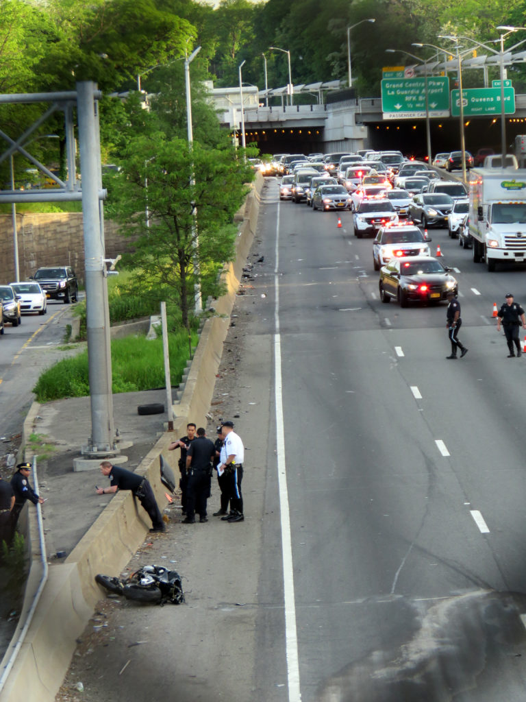 Cops investigating a deadly motorcycle accident on the Van Wyck