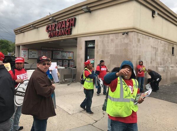 ‘Carwasheros’ strike for living wages in Flushing