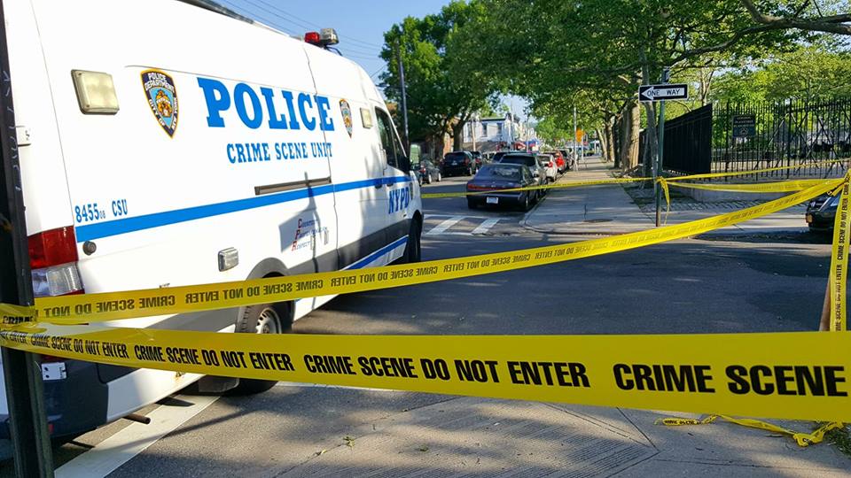 The NYPD Crime Scene Unit at the corner of Atlantic Avenue and 88th Street, where a 23-year-old man was fatally shot on May 18.