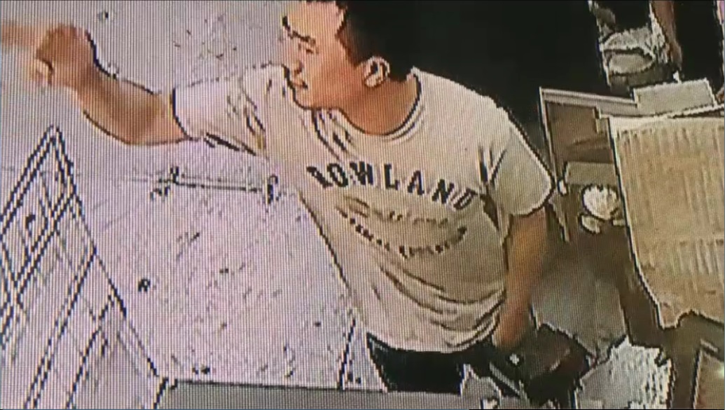 supermarket rock throwing