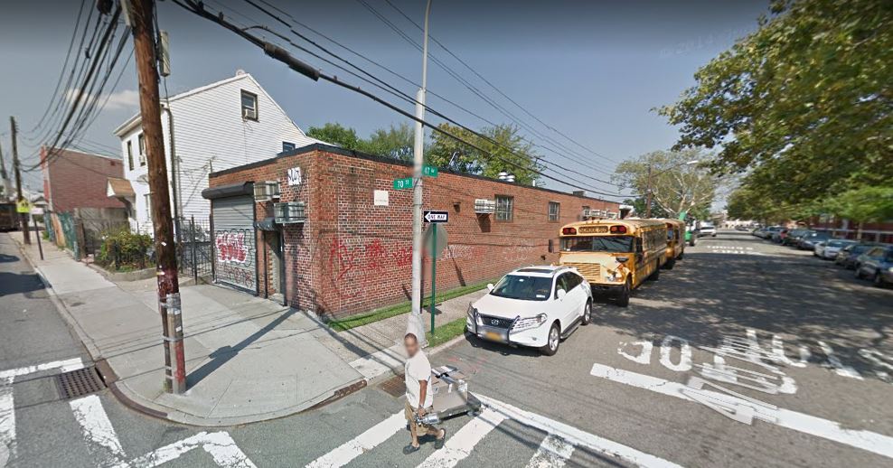 A 16-year-old girl was found unconscious and nearly naked after being sexually assaulted behind this warehouse at the corner of 47th Avenue and 70th Street in Woodside on June 25.