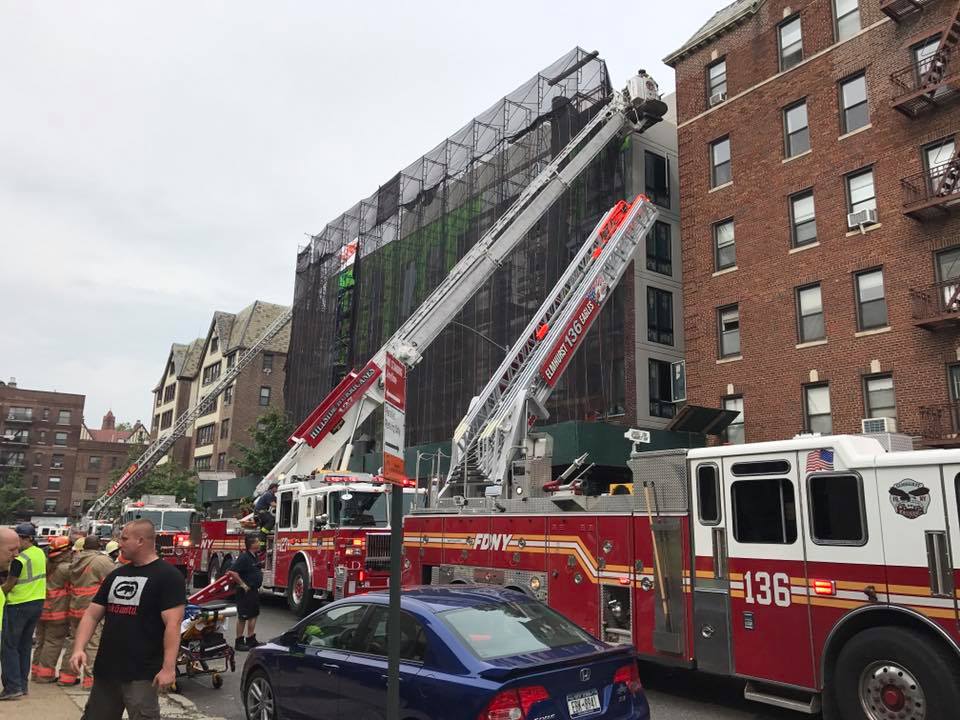 Firefighters on the scene of a one-alarm fire on 72nd Road in Forest Hills on June 23.