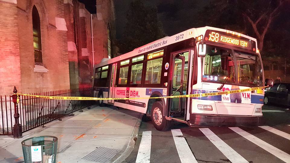 A Q58 bus rolled backward on a Brooklyn street early on the morning of June 21, hitting a number of parked vehicles before striking a church.