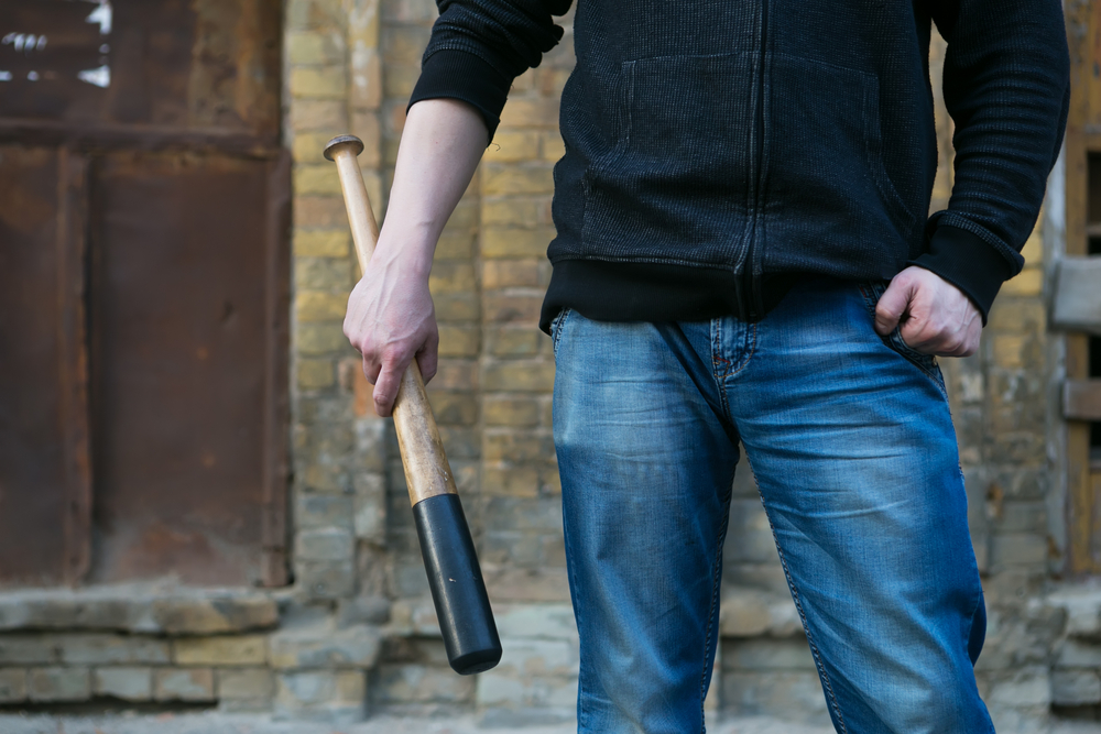 shutterstock_man with bat