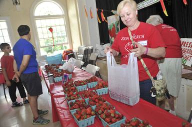 Hundreds flock to annual Strawberry Festival in Douglaston