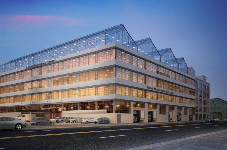 This Queens warehouse with a rooftop produce farm is sold as part of a