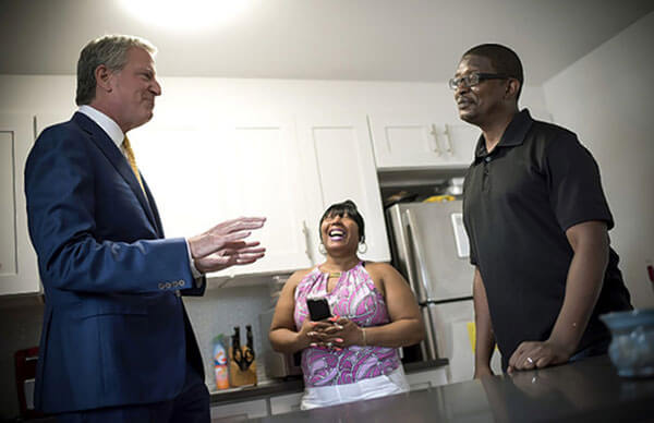 City Hall’s affordable housing plan on time and under budget