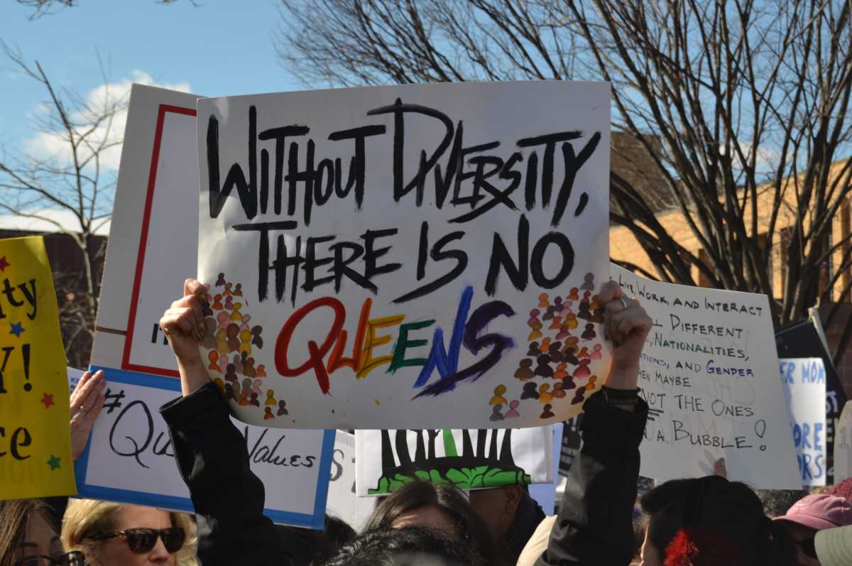 Queens diversity sign