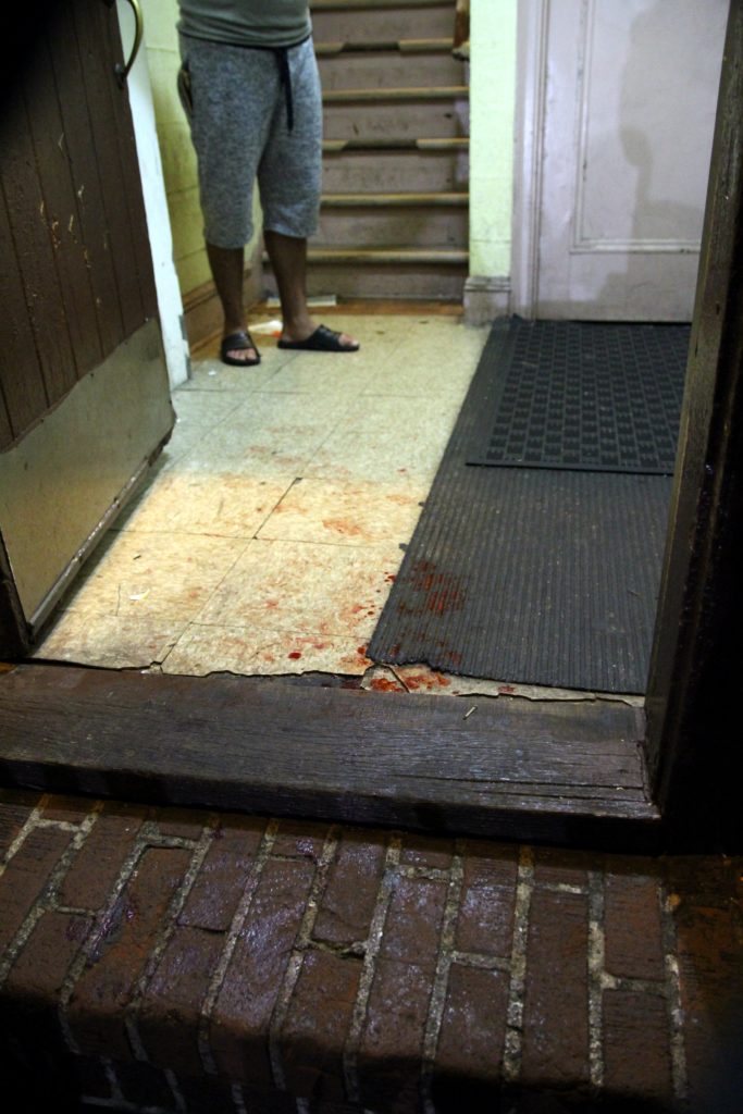 The bloody scene inside of 104-25 115 street where one of the victims ran for help at the scene of the multiple stabbing on 115 street and Liberty ave last night, the stabbing victims were across several blocks of Queens. Photos by Mari Estrella. 08/13/17