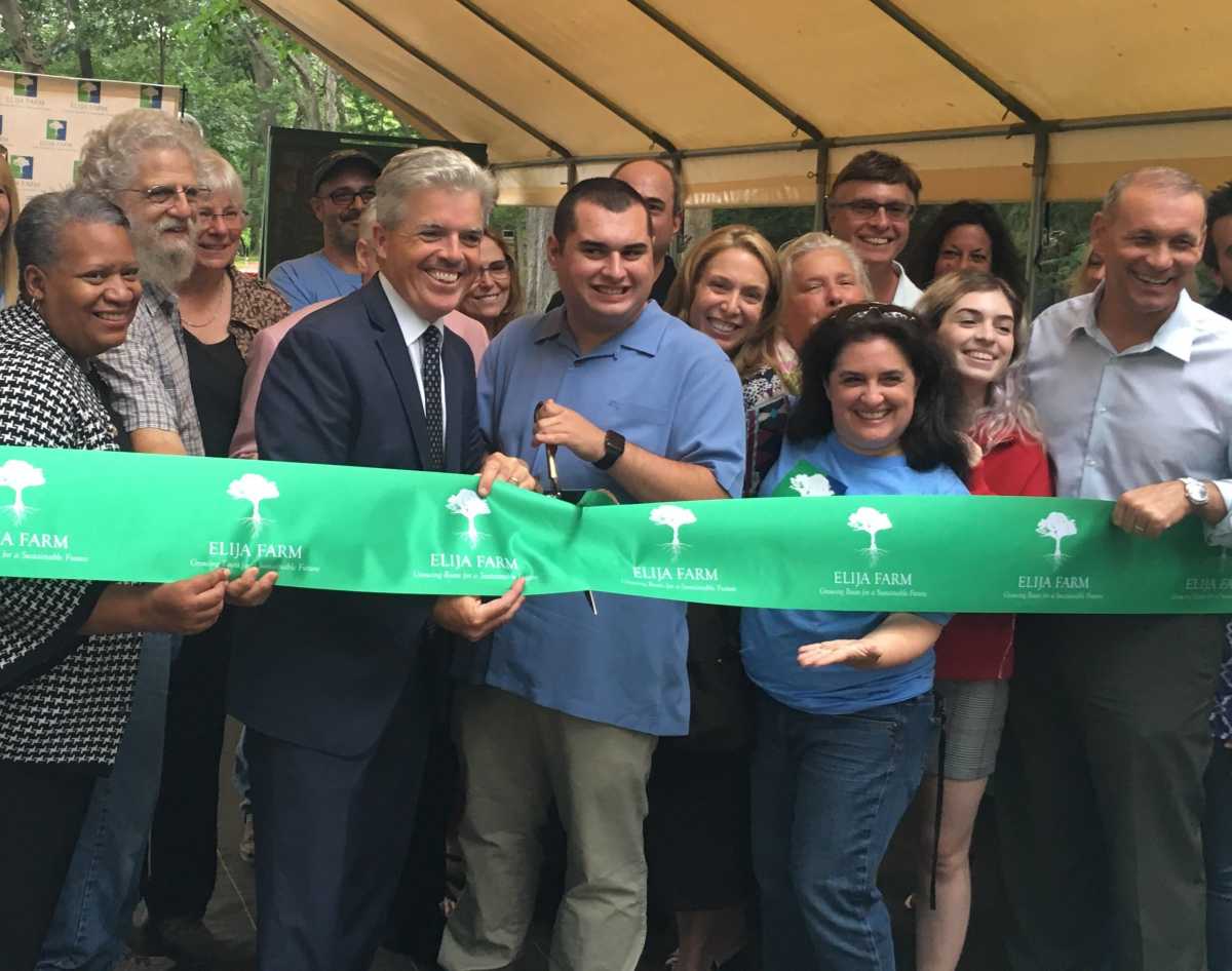 Councilwoman Tracey Edwards, Mr. and Mrs. Foglia, Mike and Lynne Koufakis (rear), with Suffolk County Executive Steve Bellone, Suffolk County Legislator Steve Stern and members of the ELIJA “family."