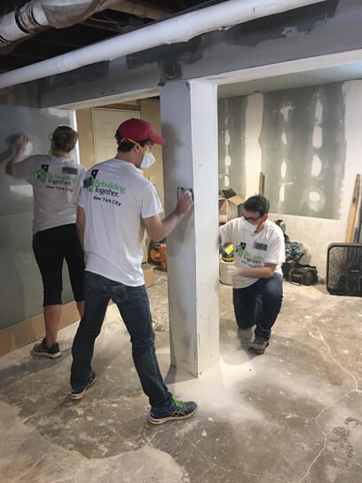 Volunteers fix Jamaica resident’s home