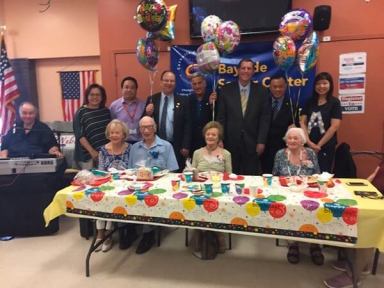 Three seniors over 100 celebrate their good fortune at Bayside Senior Center