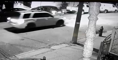 The SUV pictured above has been connected to two police impersonation robberies in North Corona and Jackson Heights.