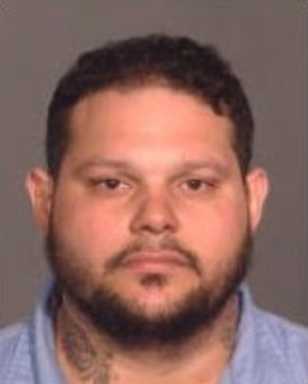 104th Precinct homicide suspect photo