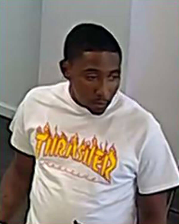 Police seek man in connection with Flushing grand larceny