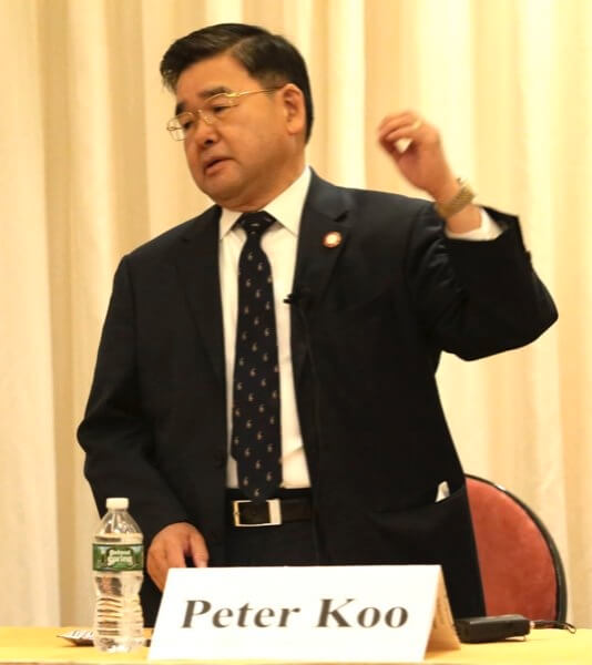 Koo comes out swinging against Tan