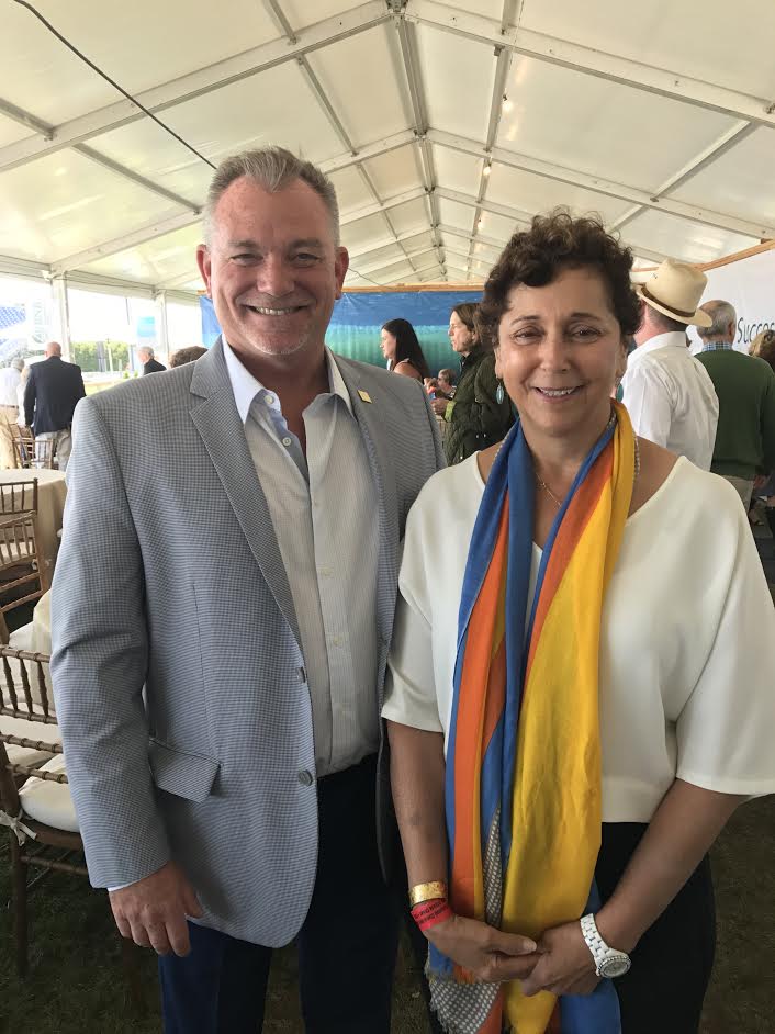 Bridgehampton National Bank President Kevin O'Connor with Vice President Claudia Pilato at the Hampton Classic.