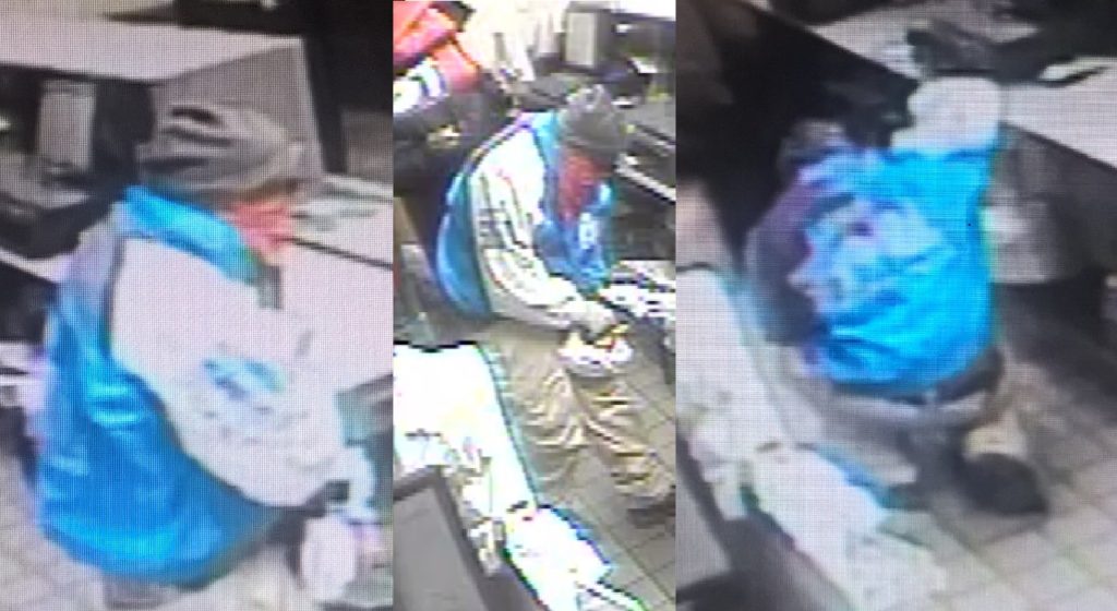 Security camera images of the suspect in the Nov. 12 armed robbery of a Woodside Pizza Hut.
