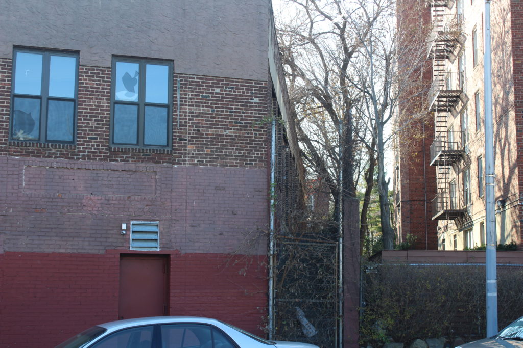 The wall that currently separates the homes from the building on 48th Street. 