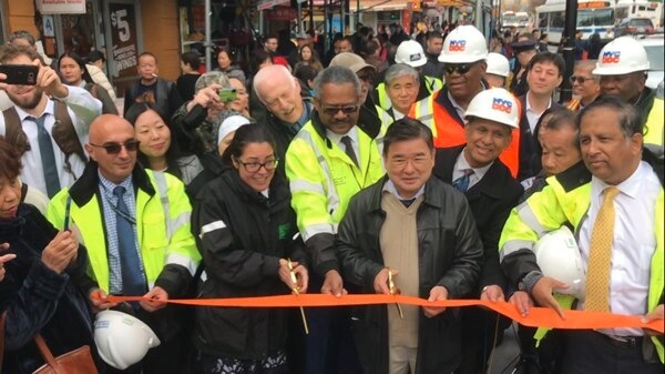 Flushing sidewalk construction complete
