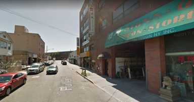 The block of Fuller Place in Flushing where a 33-year-old Maspeth woman was found dead on Saturday morning.