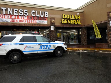 Police outside the Dollar General store in College Point that was robbed on Feb. 25.