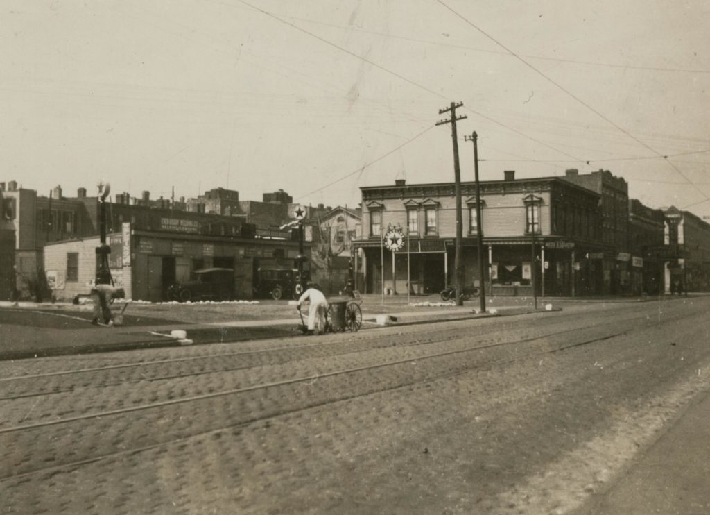 This April 1923 photo shows Myrtle Avenue looking west from 65th Street in Glendale (photo via Queens Library Digital Archives)