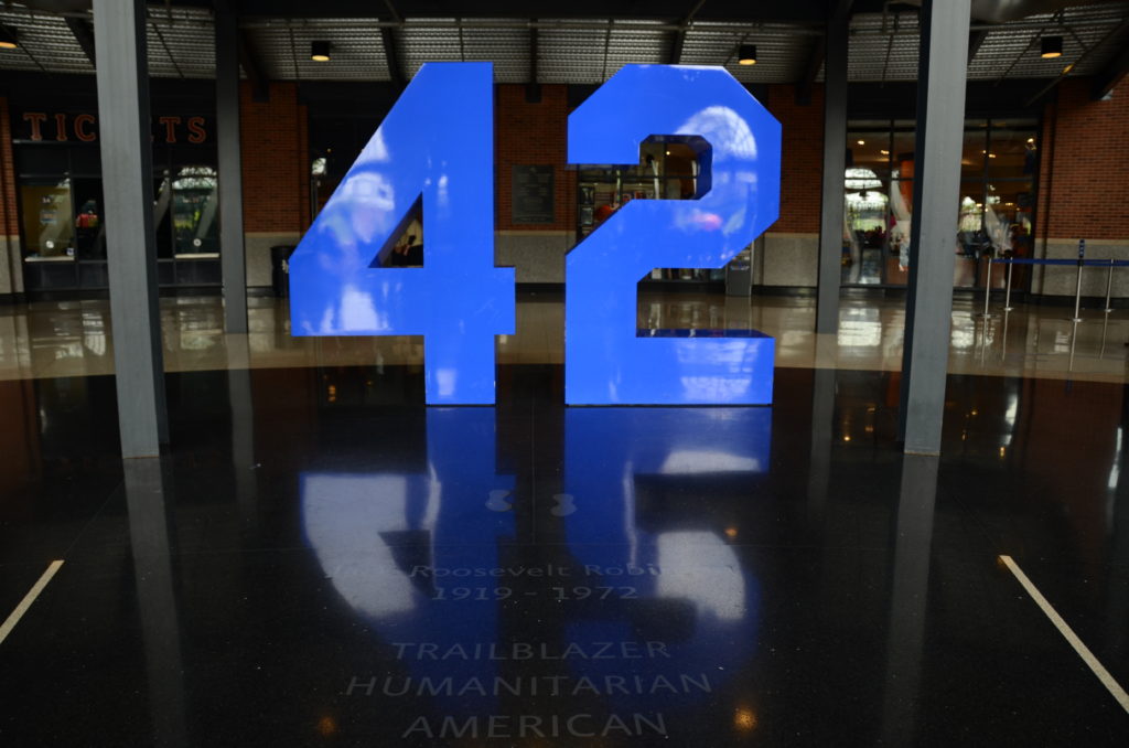 Jackie Robinson's uniform number, 42, stands tall in the Citi Field rotunda named in his honor. (photo via Flickr)
