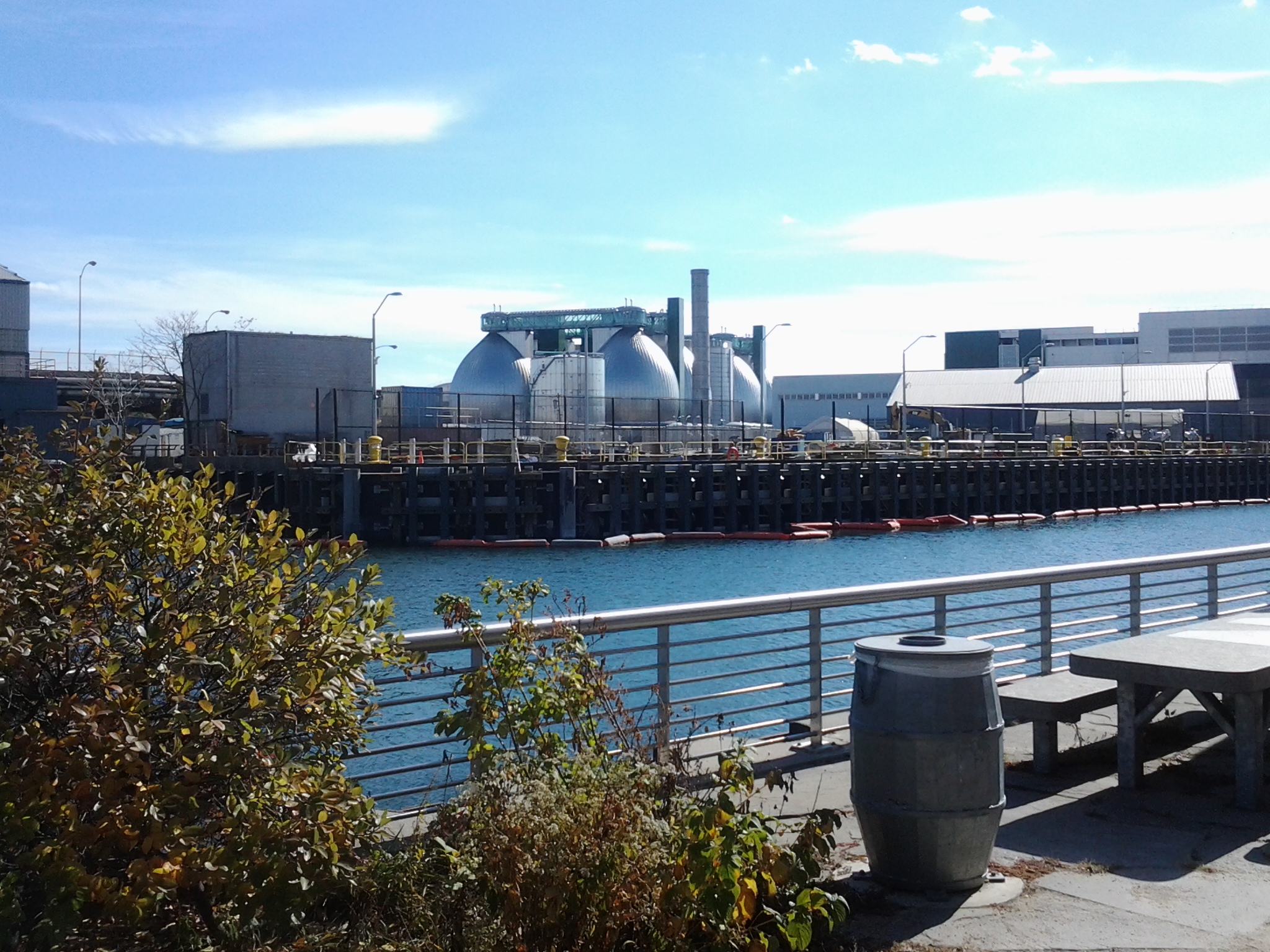 The Newtown Creek water treatment plant, with the creek in the foreground.