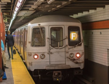 An F train at the 47th-50th Streets station in Manhattan