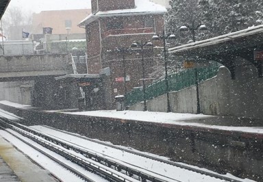 Snow falling at the Bayside Long Island Rail Road station on March 21.