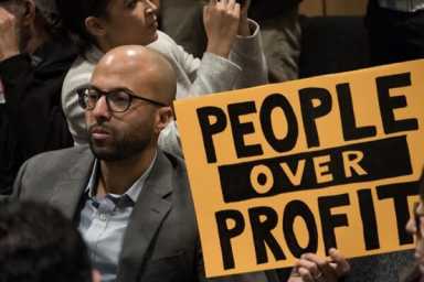 Activists rejoice as Community Board 4 votes against proposal for Target, housing structure in Elmhurst