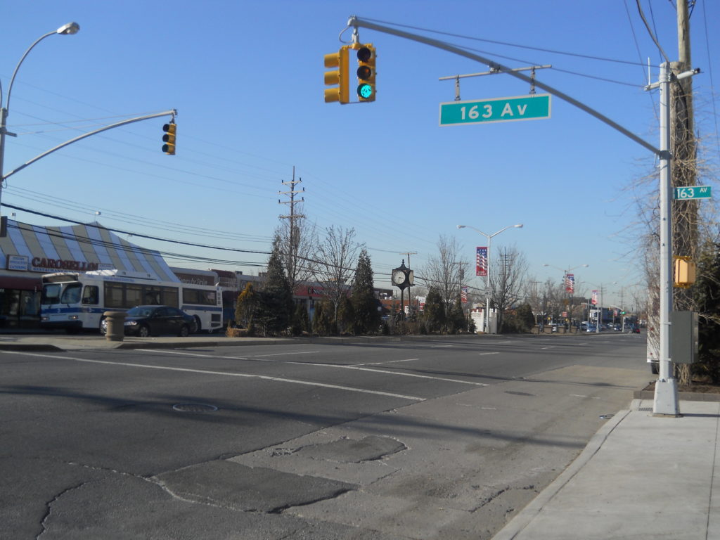 A 2011 view of Cross Bay Boulevard at 163rd Avenue in Howard Beach (Photo via Wikimedia Commons)