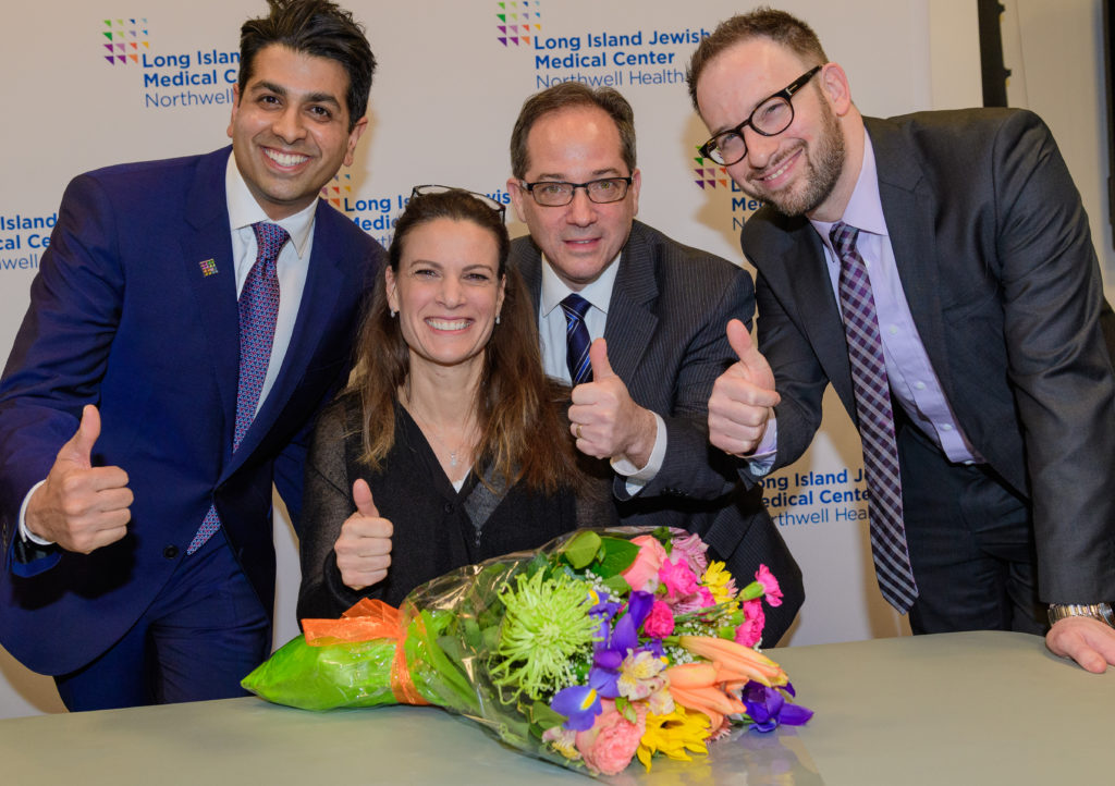  Elodie Trouche receives congratulations from her surgical team (from l. to right) Dr. Neil Tanna, Dr. Alan Kadison, Dr. Gary Deutsch