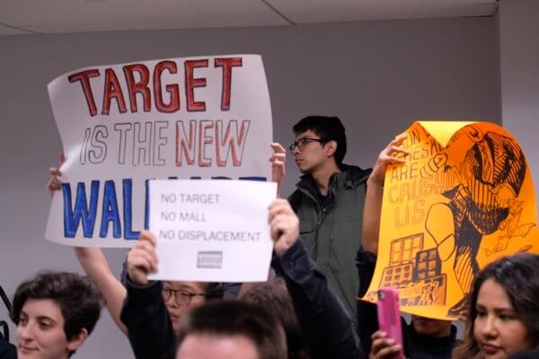 Anti-gentrification group protests committee hearing for Target proposal in Elmhurst